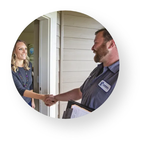 Friendly Goebel Technician Greeting Homeowner